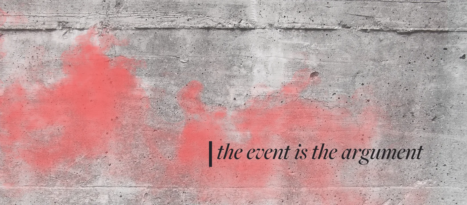 The un|frame wordmark and rationed red spray-painted onto a raw concrete wall, reading 'the event is the argument'